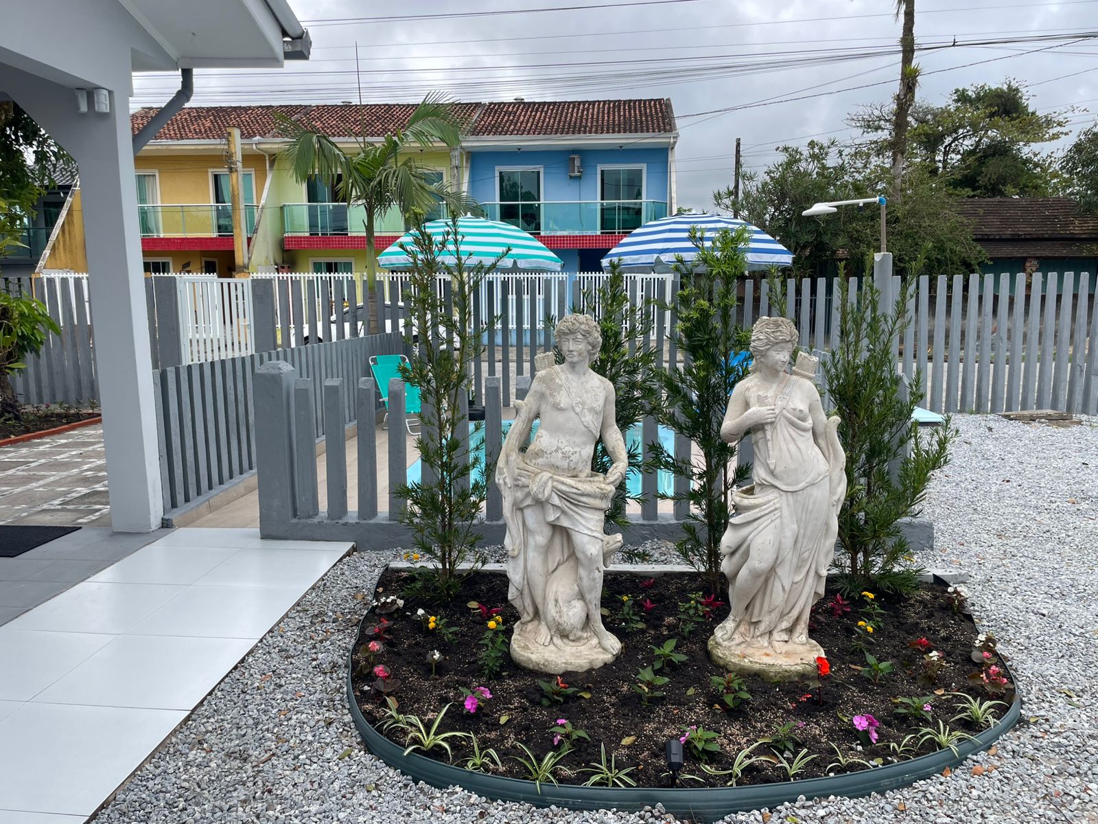 Área externa com jardim — Pousada Siri do Mar